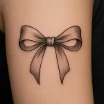 Bow tattoo — meaning and symbolism