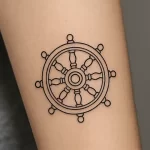 Wheel of Dharma tattoo — symbolism, meaning, and cultural significance